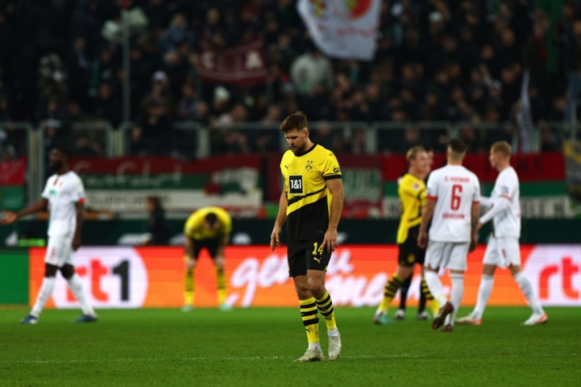 Dortmund le neodločeno v Augsburgu, visok poraz Uniona