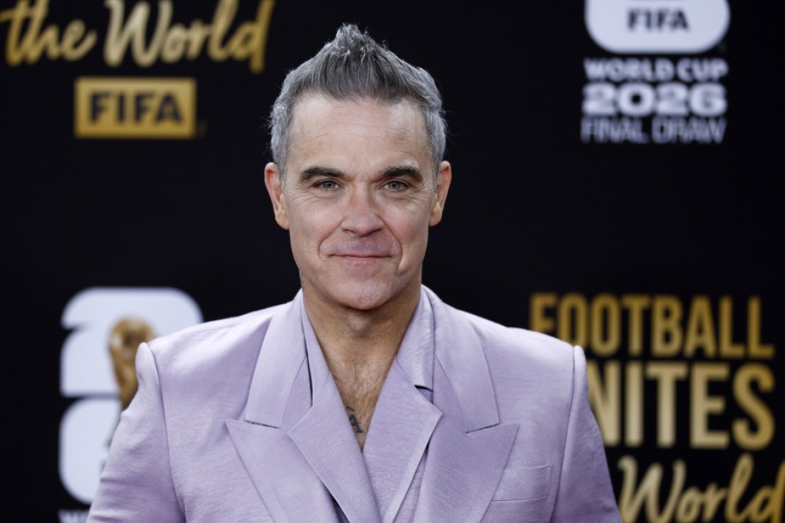 Robbie Williams z novim albumom prehitel The Beatles